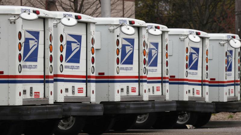 USPS trucks